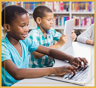 Students using laptops and tablets